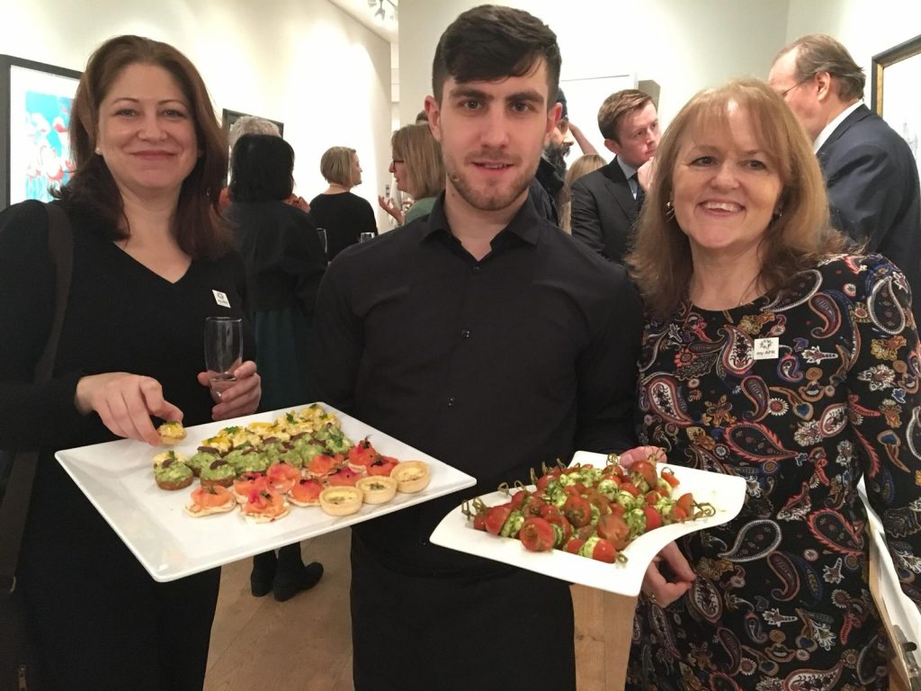 my AFK's Laura Callanan and Lyn Prodger being served canapes at an art exhibition